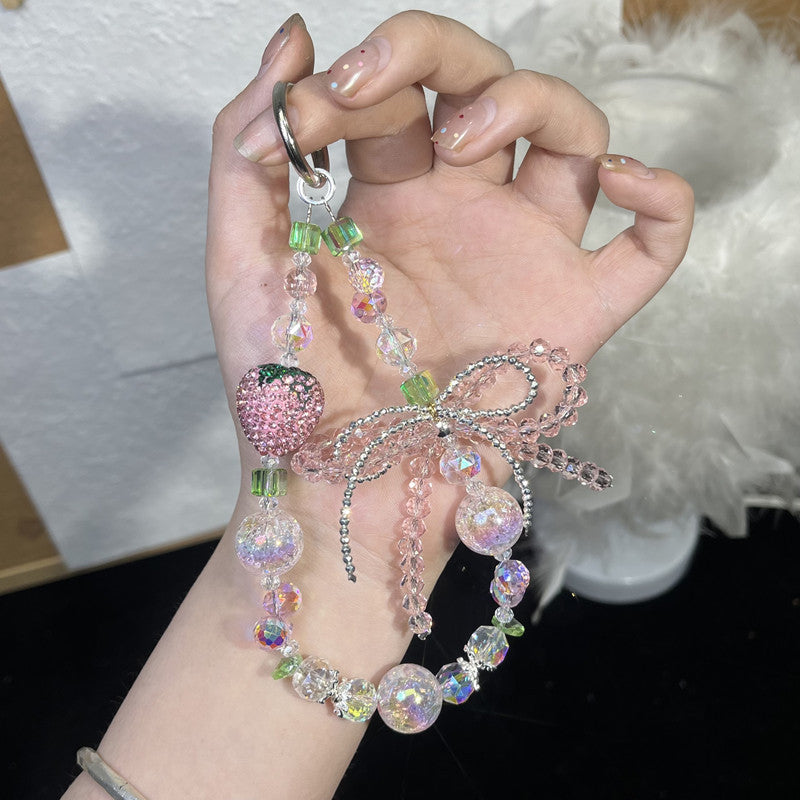 Pink strawberry and bow beaded phone charm